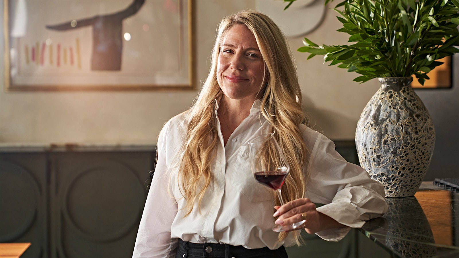 A portrait of Kristin Courville at Ernestos.